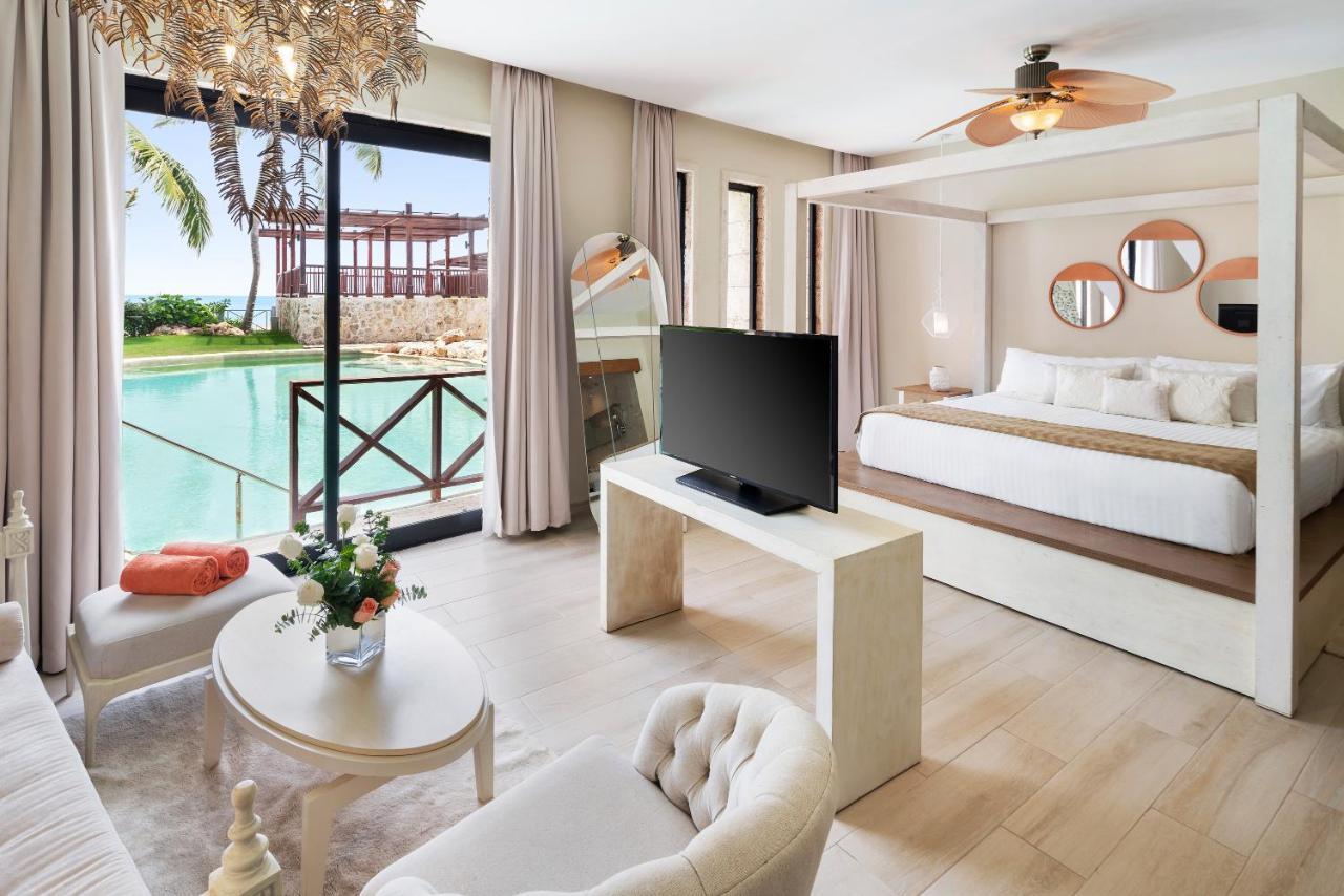 Suite Junior Swim Out con 1 cama extragrande y vistas a la piscina - Zona del castillo